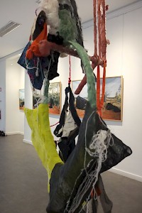 JULIEN CREUZET We were Clouds of a black cloud, following the twilight of a renewing sun. To hold is the clone of the hold on the sea, on the road, praise, mirage, There is love in the future , 2019 Plastic, fabrics, strings, electrical wiring, seashell